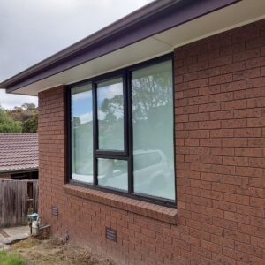 Fixed-picture-windows-with-energy-efficient-double-glazed-glass-units-in-black-exterior-UPVC-frames-1