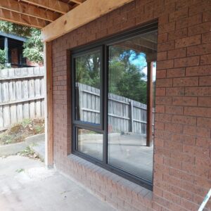 Fixed-picture-windows-with-energy-efficient-double-glazed-glass-units-in-black-exterior-UPVC-frames-2
