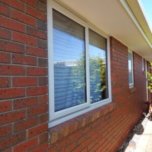 fixed-picture-windows-with-energy-efficient-double-glazed-glass-units-in-Black-exterior-and-white-interior-UPVC-frames-5