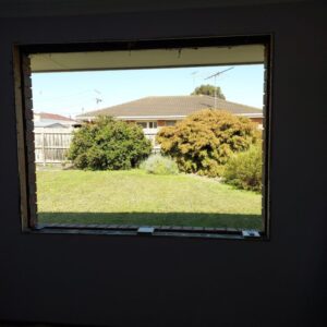 fixed-picture-windows-with-energy-efficient-double-glazed-glass-units-in-Black-exterior-and-white-interior-UPVC-frames-6